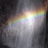Rainbow against a waterfall